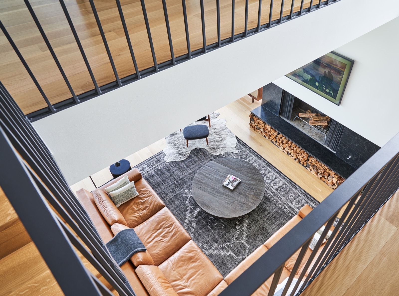Looking down into the living room from the open stair